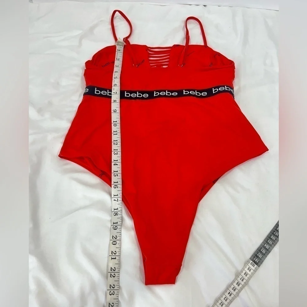 Bebe blood orange red swimsuit black band with logo size XL